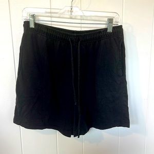 Black track shorts with pockets